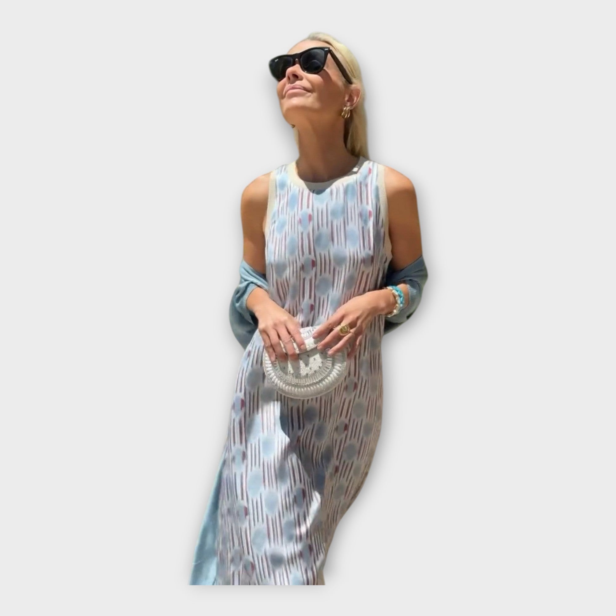 Vestido comprido com estampados lineares e fluidez