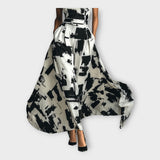 Vestido comprido com elegância artística