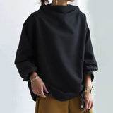 Alana - Blusa de malha macia de gola alta