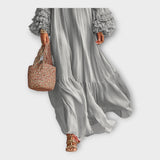 Vestido comprido e arejado com detalhes elegantes